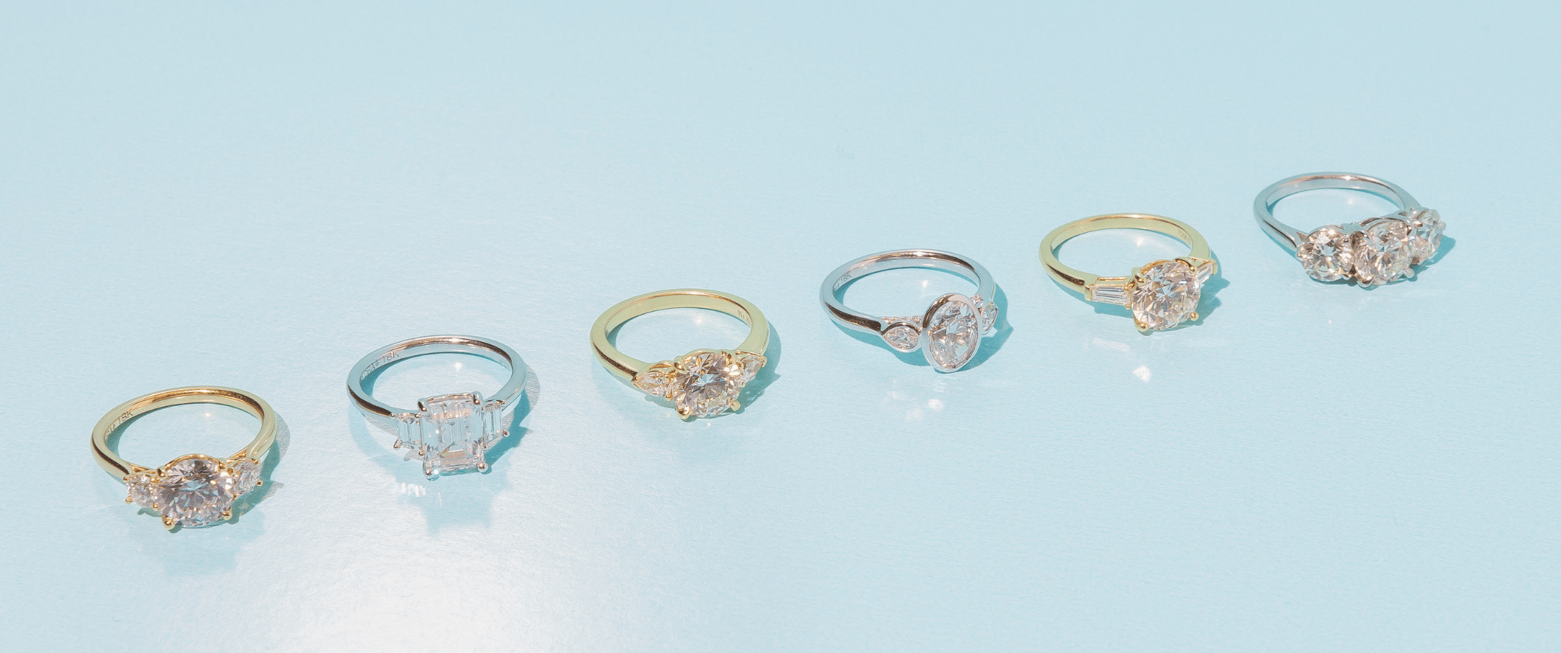 Three Stone & Side Stone Engagement Rings