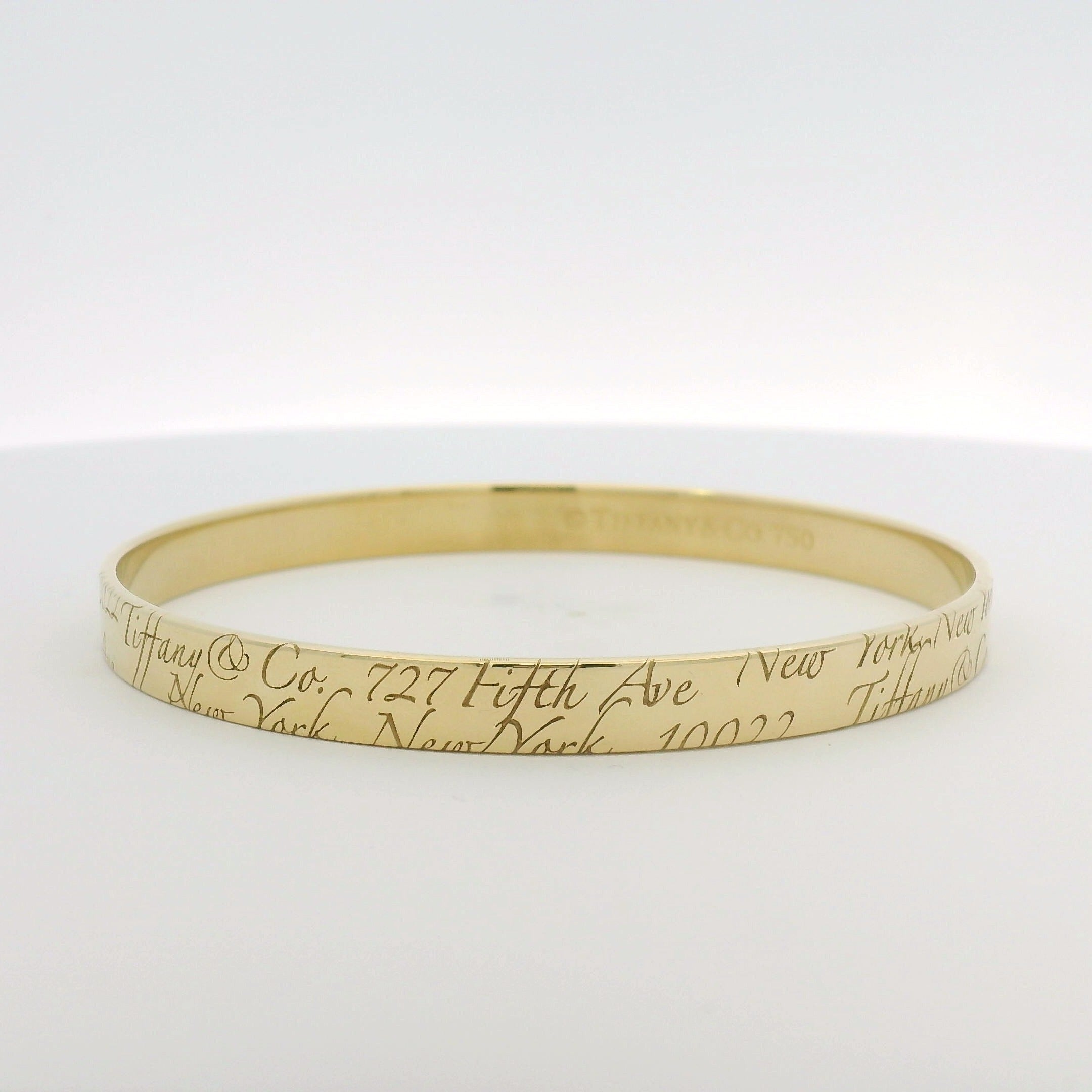 Estate Tiffany & Co. 18k Yellow Fifth Avenue Engraved Bangle 
