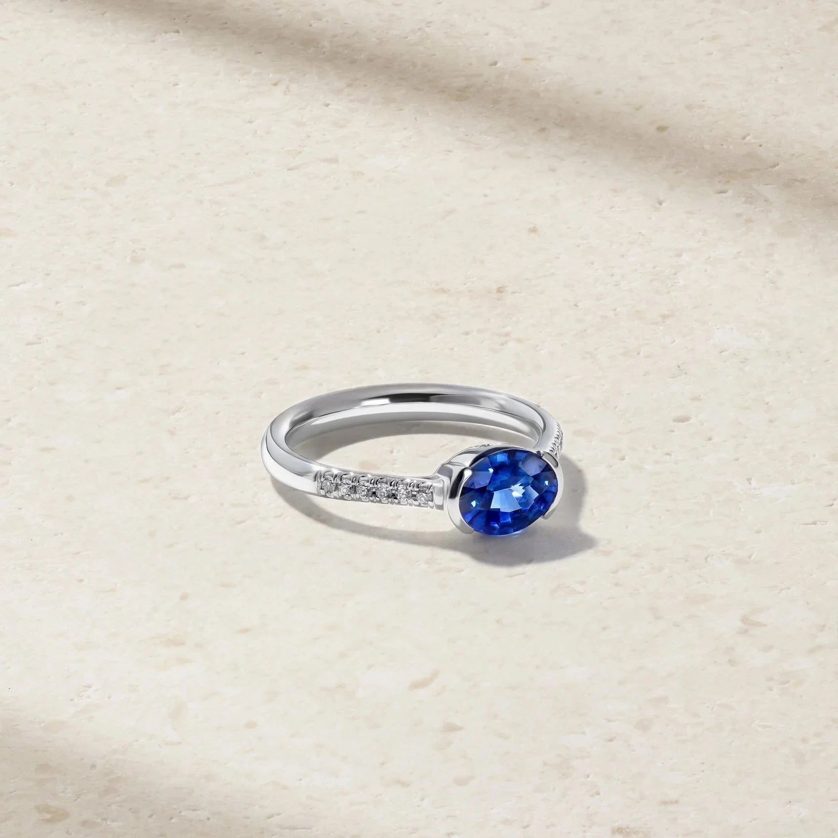 Mark Henry Mark Henry East-West Half Bezel 18k White Gold Blue Sapphire and Diamond Ring