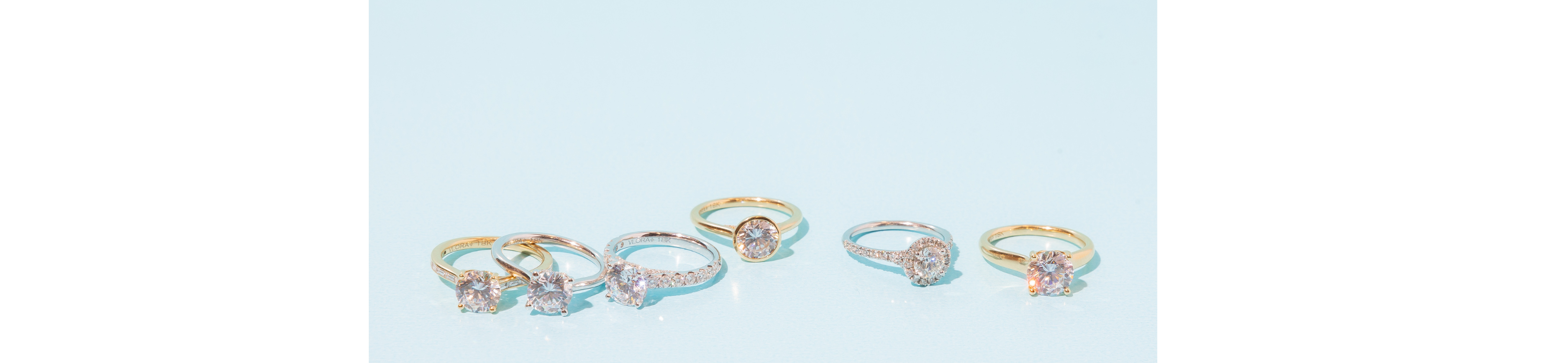 round-brilliant-mixed-engagement-rings