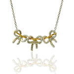 Estate Tiffany & Co. Necklaces and Pendants Tiffany & Co. Estate Sterling Silver & 18K Yellow Gold Three Bow Necklace