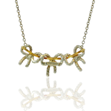 Estate Tiffany & Co. Necklaces and Pendants Tiffany & Co. Estate Sterling Silver & 18K Yellow Gold Three Bow Necklace