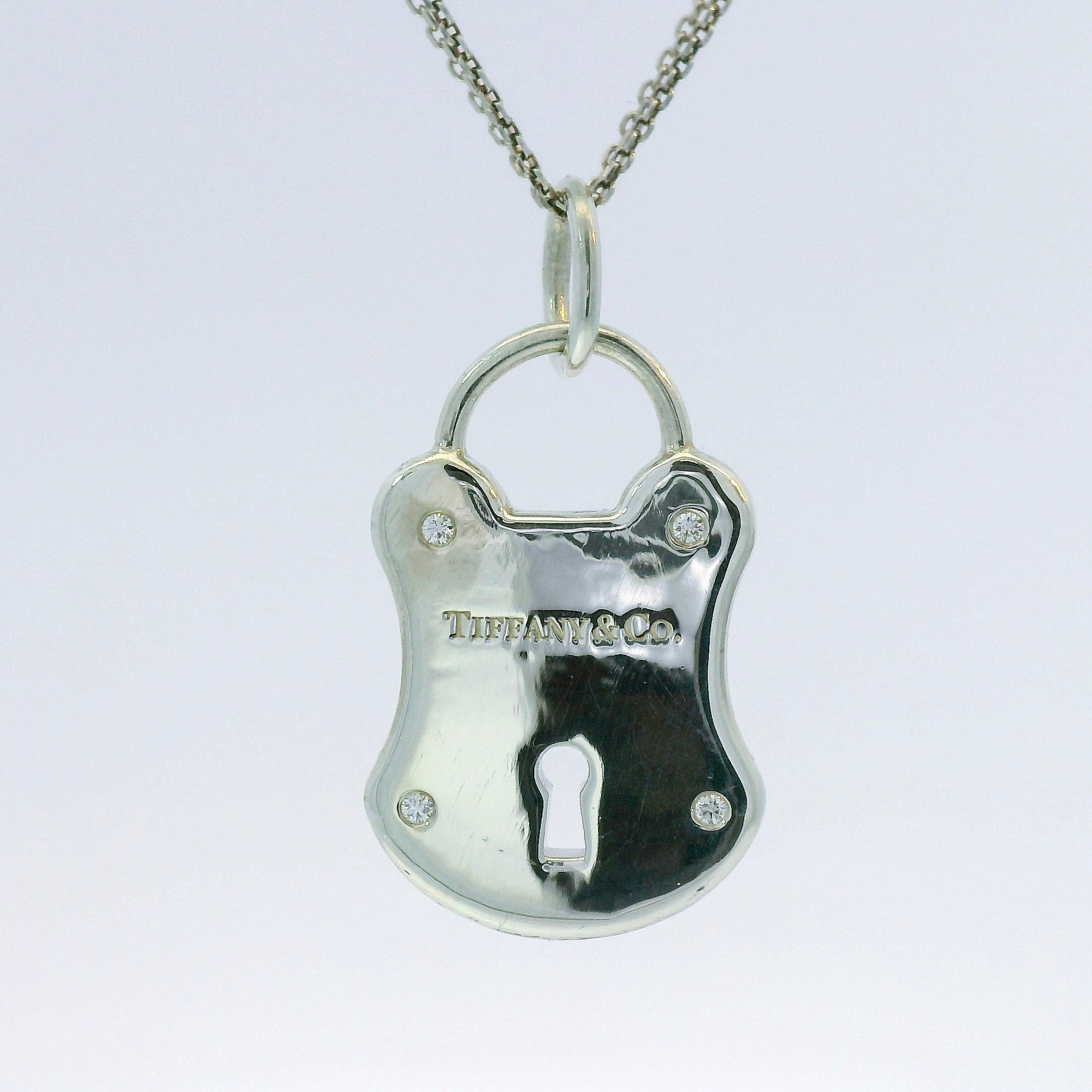 Estate Tiffany & Co. Necklaces and Pendants Tiffany & Co. Estate Sterling Silver Diamond Accent Padlock Charm