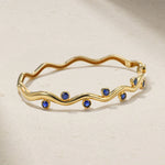 Mark Henry Bracelet Mark Henry 18k Yellow Gold Riva Wavy Sapphire Bangle