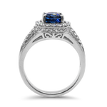 PAGE Estate Ring Estate 18K White Gold Oval Blue Sapphire and Diamond Halo Ring 5.5