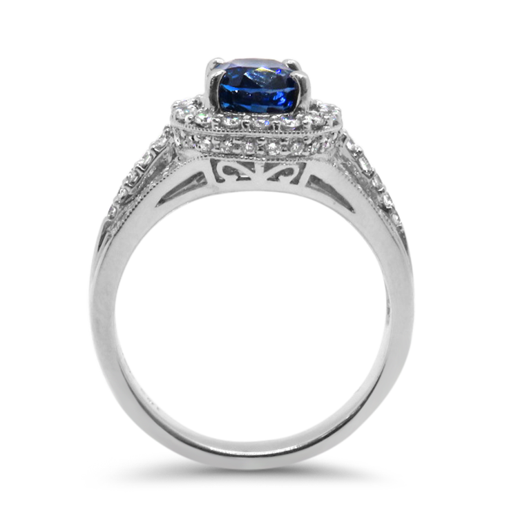 PAGE Estate Ring Estate 18K White Gold Oval Blue Sapphire and Diamond Halo Ring 5.5