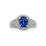 PAGE Estate Ring Estate 18K White Gold Oval Blue Sapphire and Diamond Halo Ring 5.5
