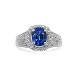 PAGE Estate Ring Estate 18K White Gold Oval Blue Sapphire and Diamond Halo Ring 5.5