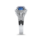 PAGE Estate Ring Estate 18K White Gold Oval Blue Sapphire and Diamond Halo Ring 5.5
