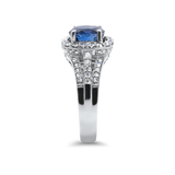 PAGE Estate Ring Estate 18K White Gold Oval Blue Sapphire and Diamond Halo Ring 5.5