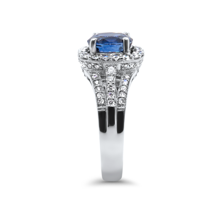 PAGE Estate Ring Estate 18K White Gold Oval Blue Sapphire and Diamond Halo Ring 5.5