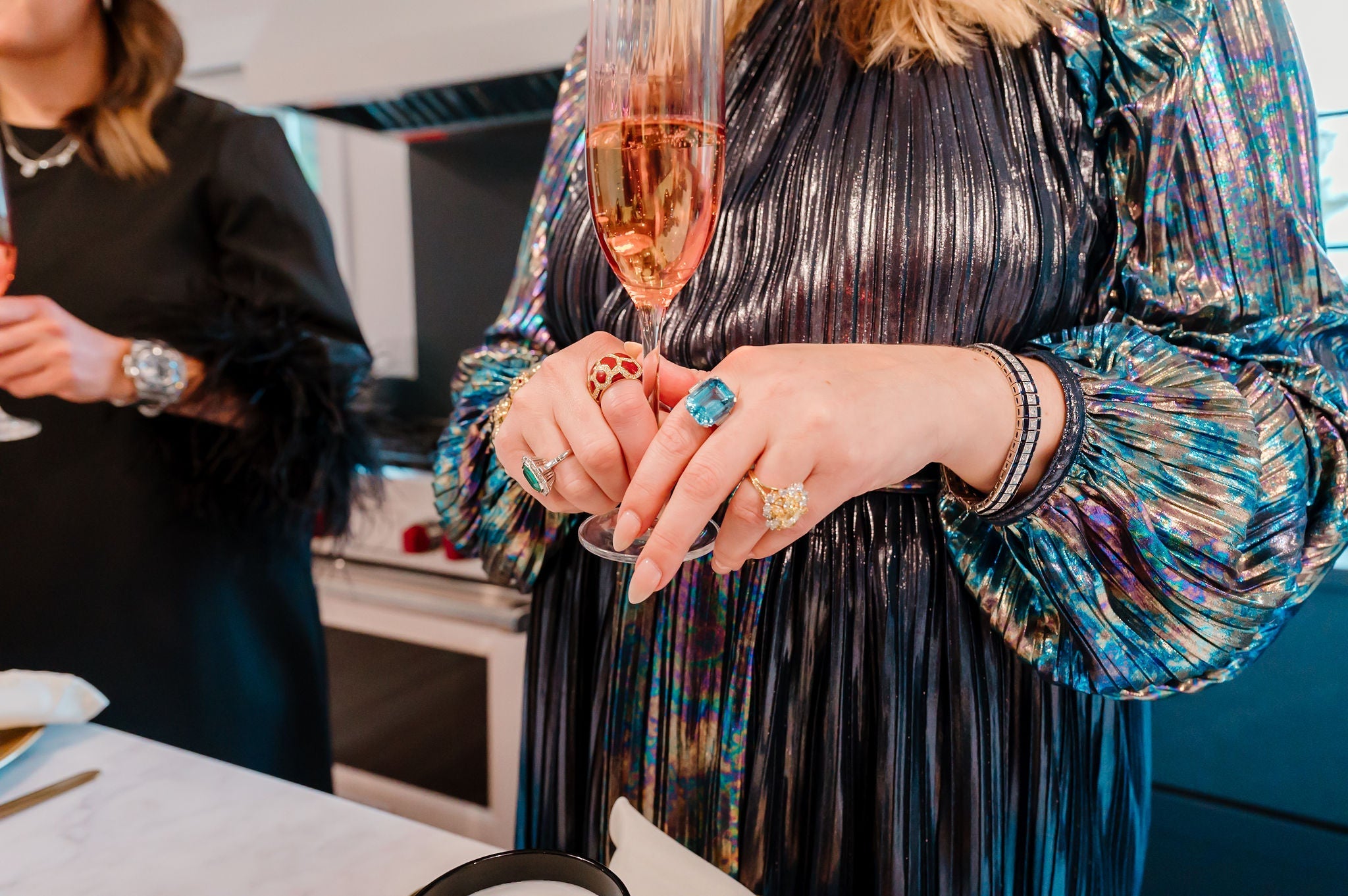 Silver necklace on black surface