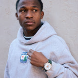 Springer's Collection Watch Hearts of Pine Limited Edition Watch, 40mm, on wrist with sweatshirt